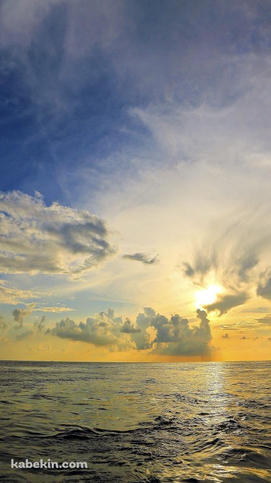 夕焼け時の海のAndroidの壁紙(540px x 960px) スマホ用