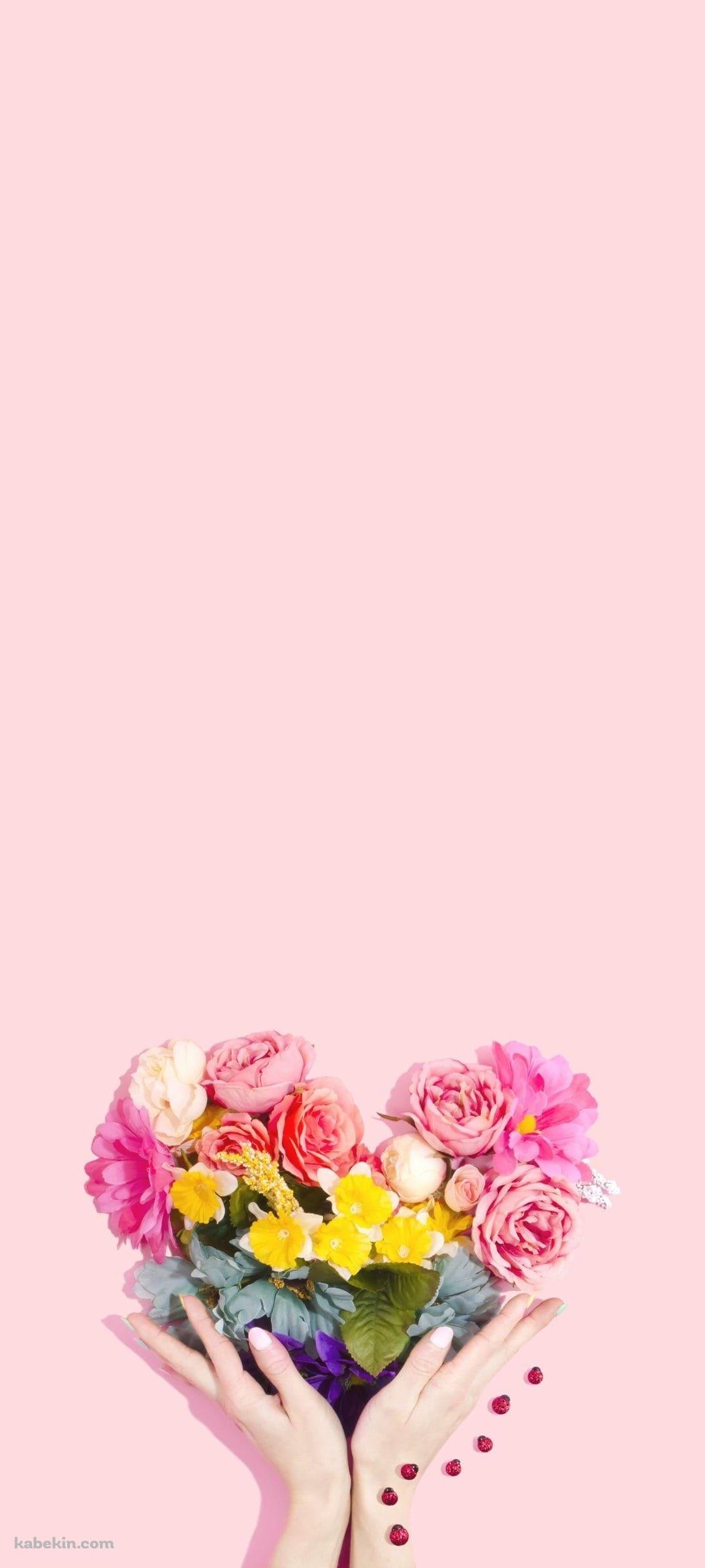 可愛いハート型のフラワーアレンジメントのAndroidの壁紙(1080px x 2400px) スマホ用