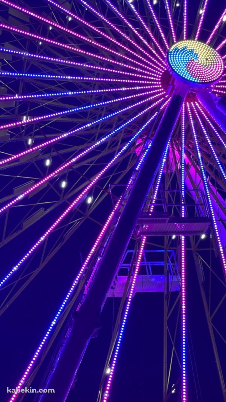 光る夜の観覧車のAndroidの壁紙(720px x 1280px) スマホ用