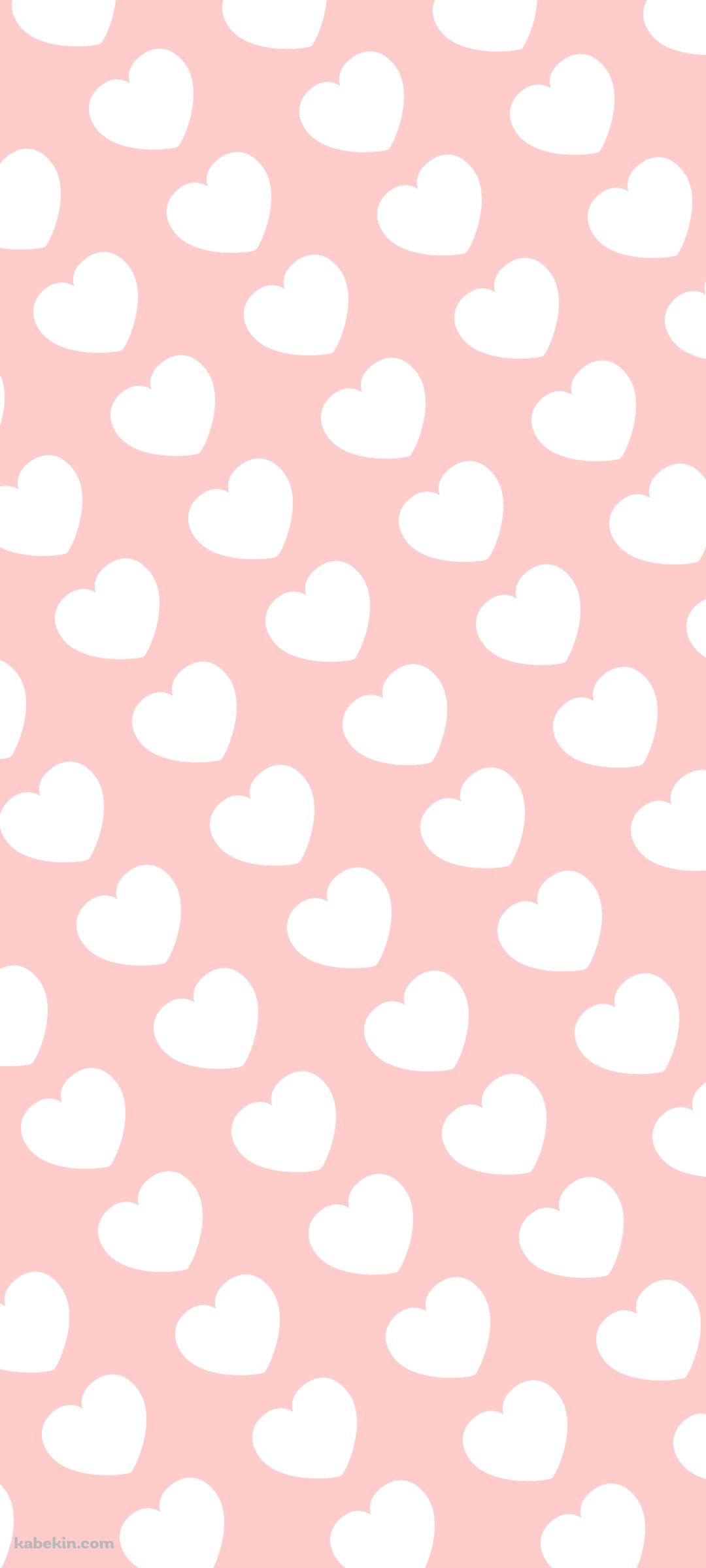かわいいピンクのハート模様のAndroidの壁紙(1080px x 2400px) スマホ用