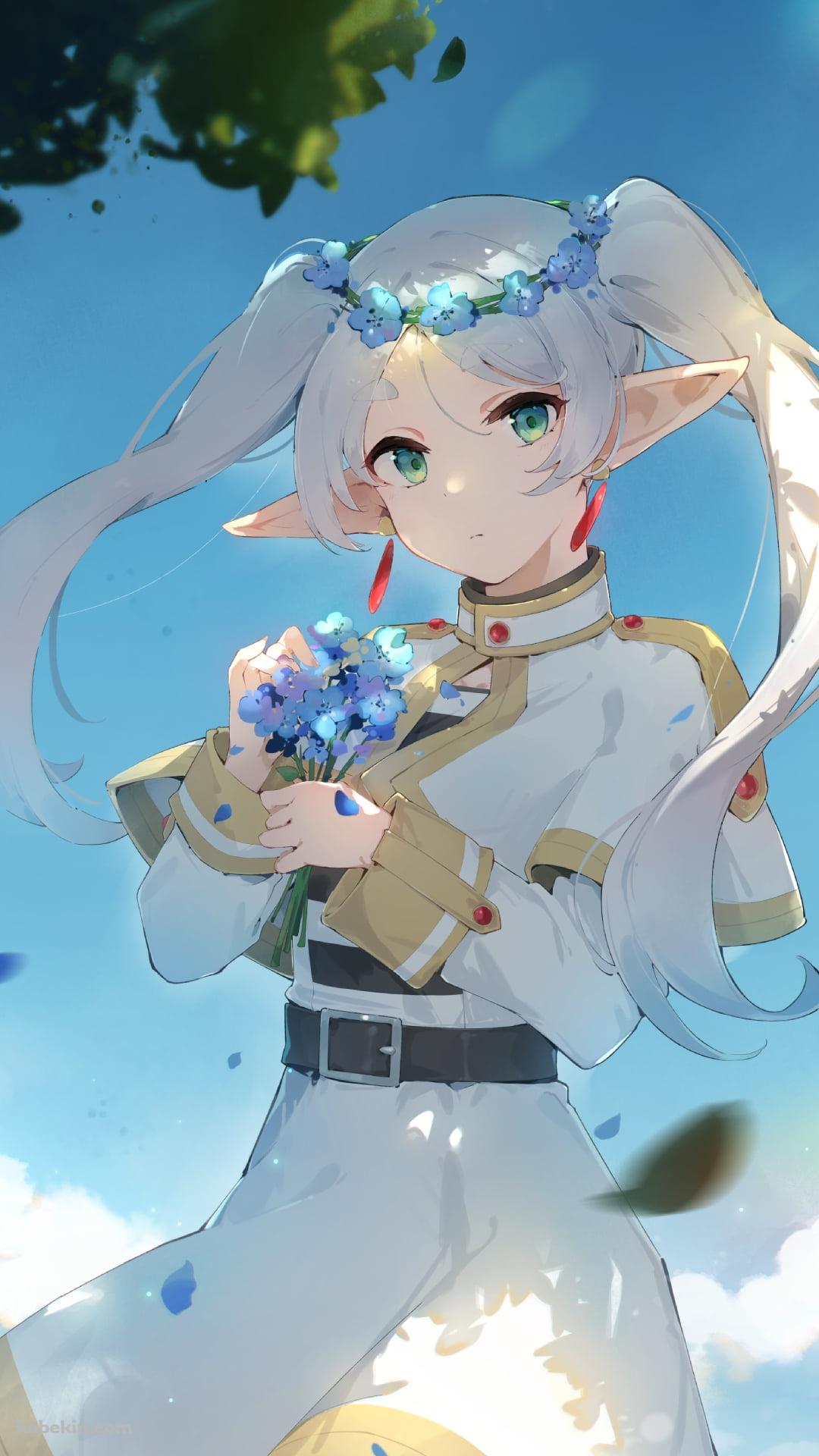青い花を摘むフリーレン / 緑の瞳 / ツインテール / 葬送のフリーレンのAndroidの壁紙(1080px x 1920px) スマホ用
