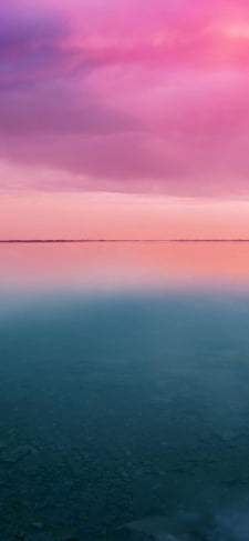 ピンクの空 青の海のiPhone / スマホ壁紙