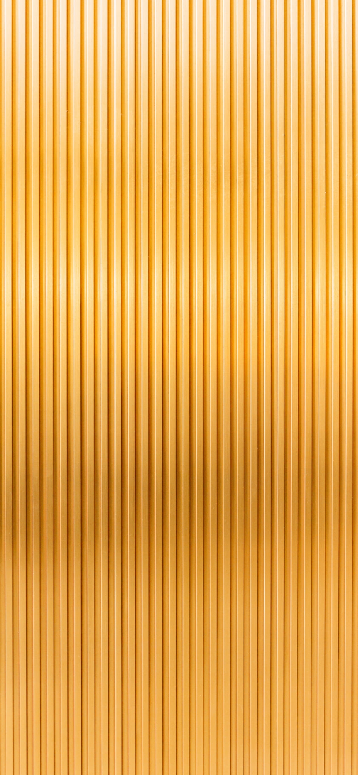 凹凸のある綺麗な金色のテクスチャーの1170 x 2532 / スマホ壁紙