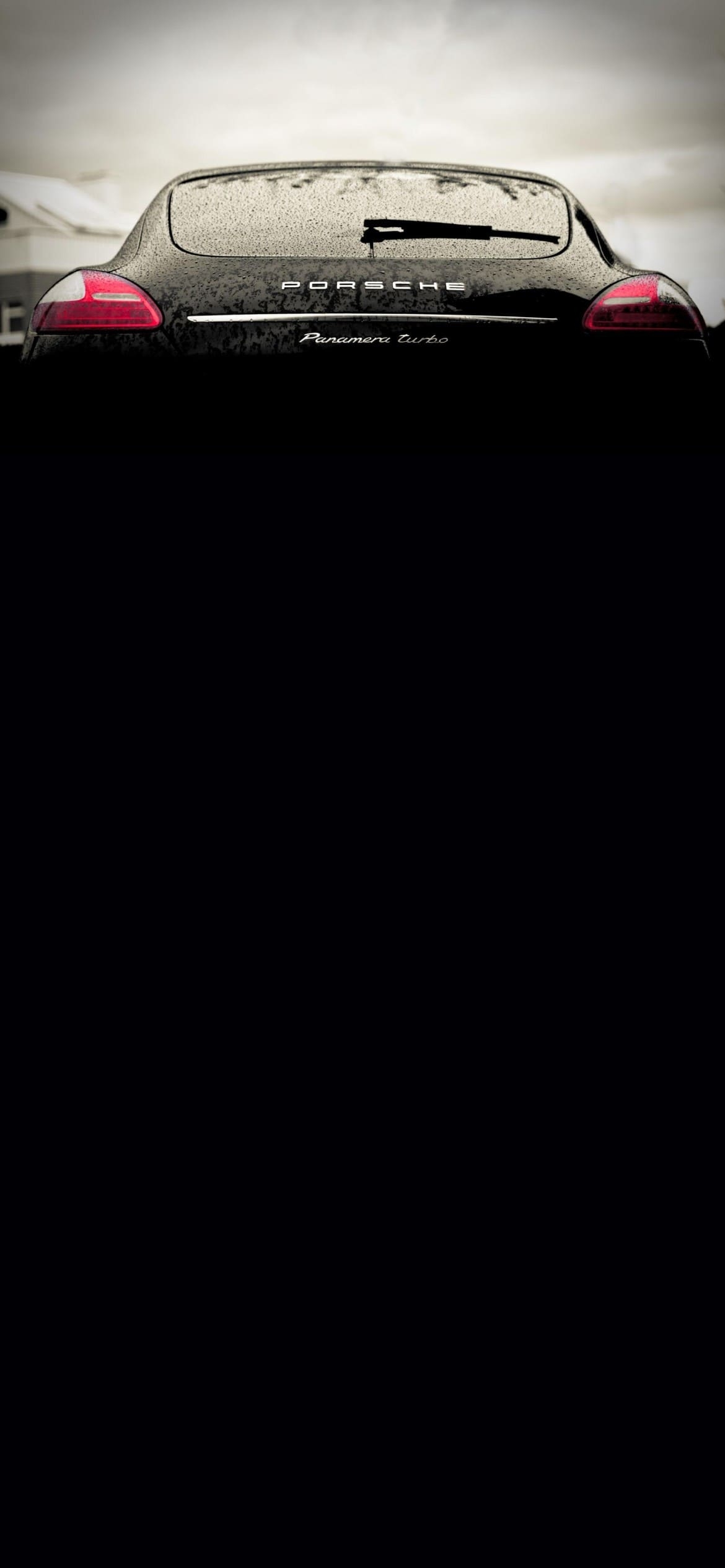 黒のポルシェ パナメーラの1170 x 2532 / スマホ壁紙