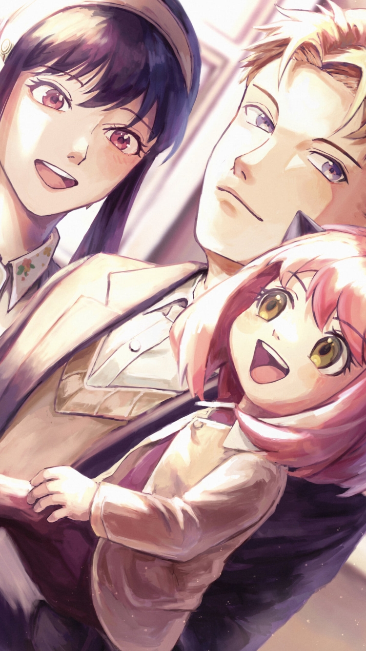 笑顔のロイド・フォージャー / ヨル・フォージャー / アーニャ・フォージャー / 抱っこ / スパイファミリーの750 x 1334 / スマホ壁紙