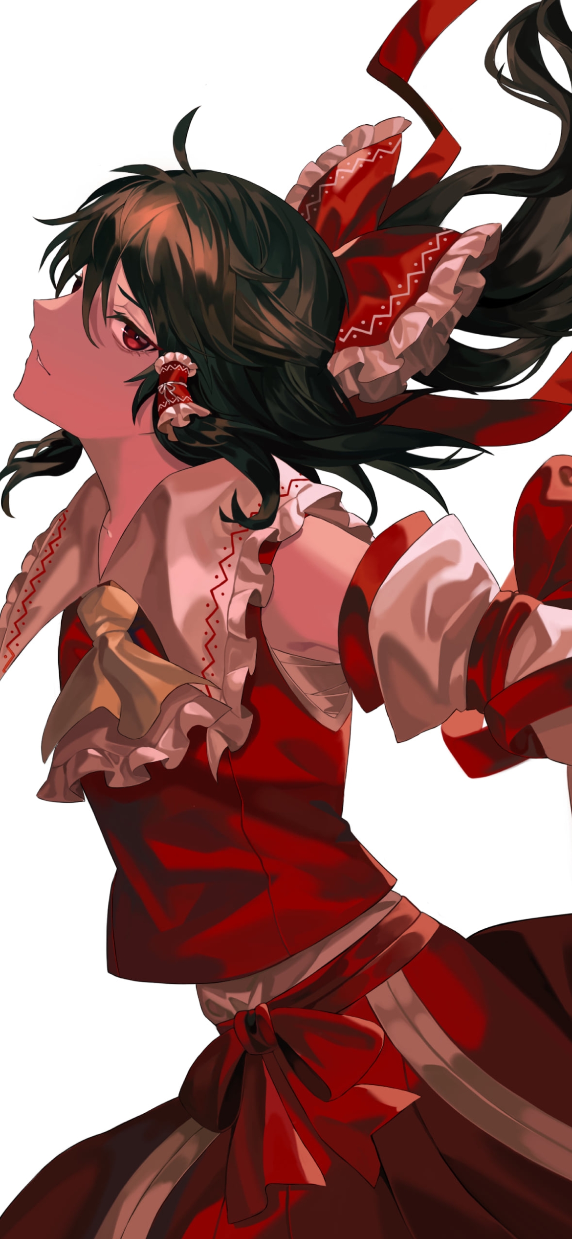 髪をなびかせ赤い瞳でこちらを見つめるかっこいい博麗霊夢 / 東方の1170 x 2532 / スマホ壁紙