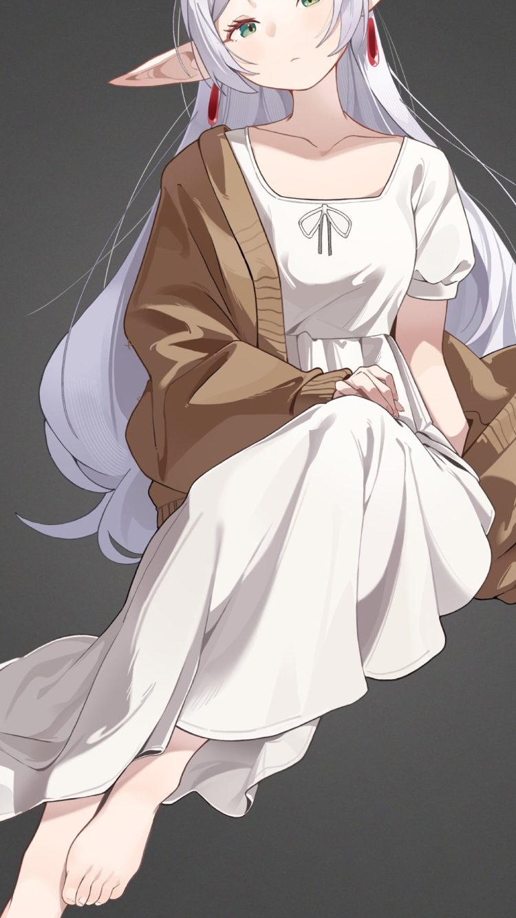 茶色いカーディガンを羽織ったフリーレン / 葬送のフリーレンの750 x 1334 / スマホ壁紙