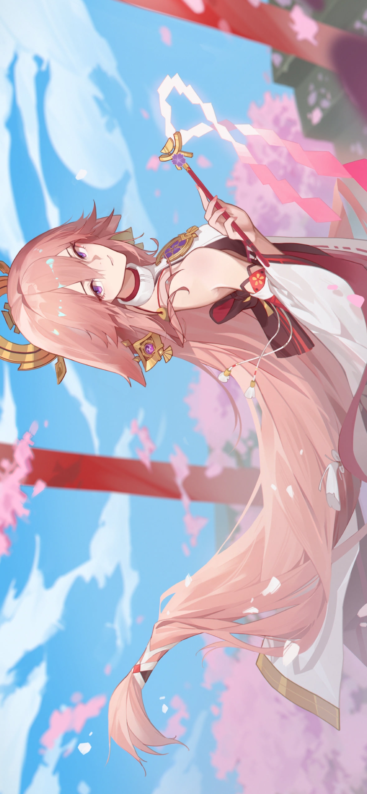 こちらを見つめる御幣を持った八重神子 / 原神の1170 x 2532 / スマホ壁紙