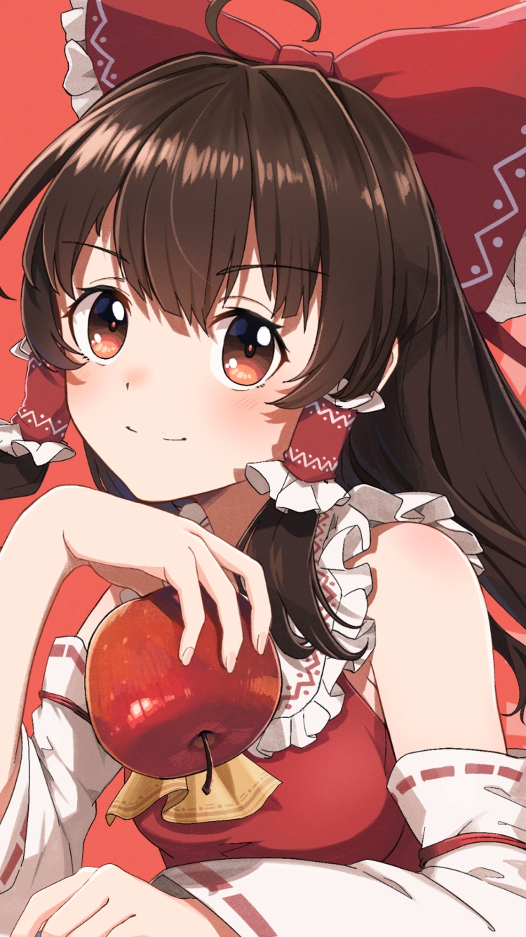 赤いリンゴを持つ博麗霊夢 / 東方の750 x 1334 / スマホ壁紙