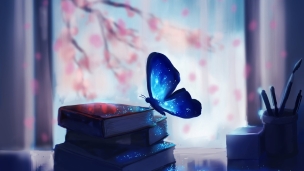 辞典にとまる青いアゲハ蝶のデスクトップPC用の壁紙