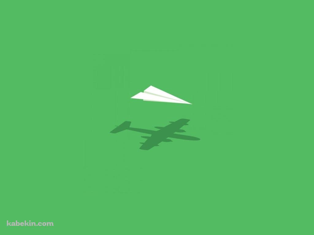 白い紙飛行機 緑の背景の壁紙(1024px x 768px) 高画質 PC・デスクトップ用