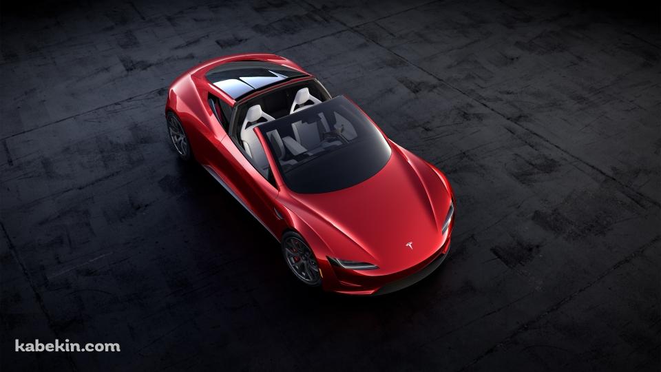 斜め上から見た赤いテスラの車 オープンカーの壁紙(960px x 540px) 高画質 PC・デスクトップ用