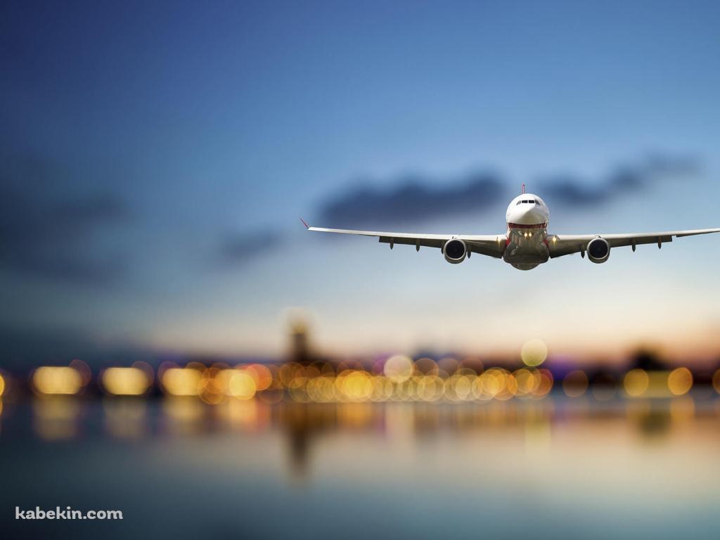飛行機 ボヤけた背景の壁紙(1024px x 768px) 高画質 PC・デスクトップ用