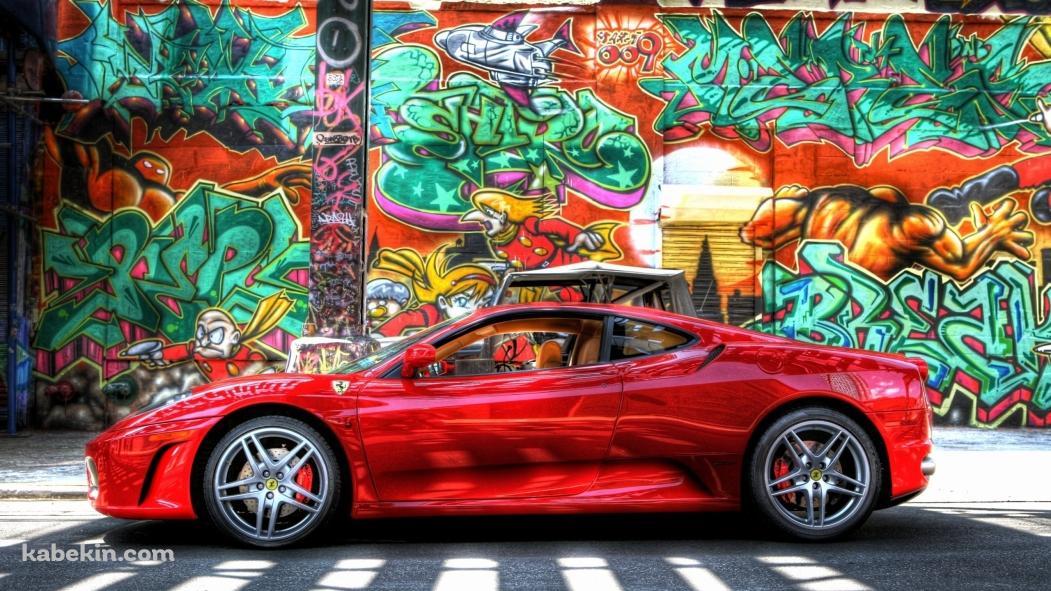 赤いフェラーリと壁のアートの壁紙(1051px x 591px) 高画質 PC・デスクトップ用