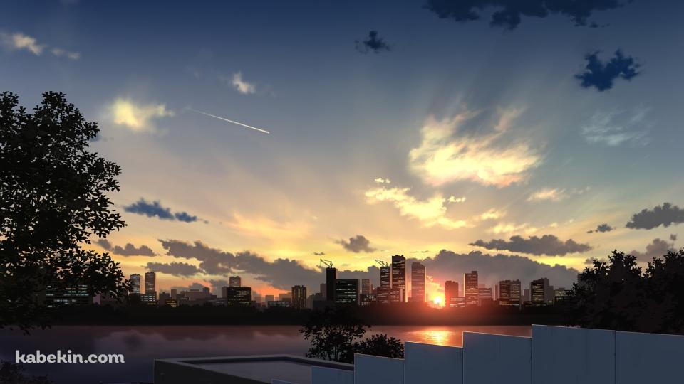 白いフェンス越しに見る水辺と夕陽の壁紙(960px x 540px) 高画質 PC・デスクトップ用
