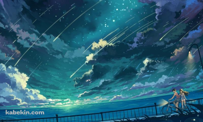 海沿いの道を自転車で二人乗りをするカップル / 流れ星の壁紙(800px x 480px) 高画質 PC・デスクトップ用