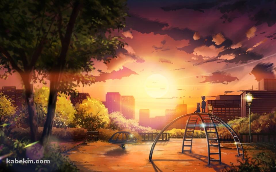 公園の遊具の上に立ち夕陽を眺める子供の壁紙(960px x 600px) 高画質 PC・デスクトップ用