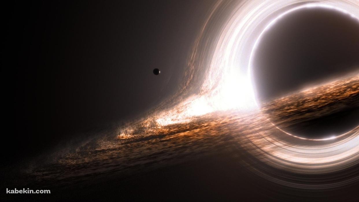 光る円状の惑星の壁紙(1242px x 698px) 高画質 PC・デスクトップ用