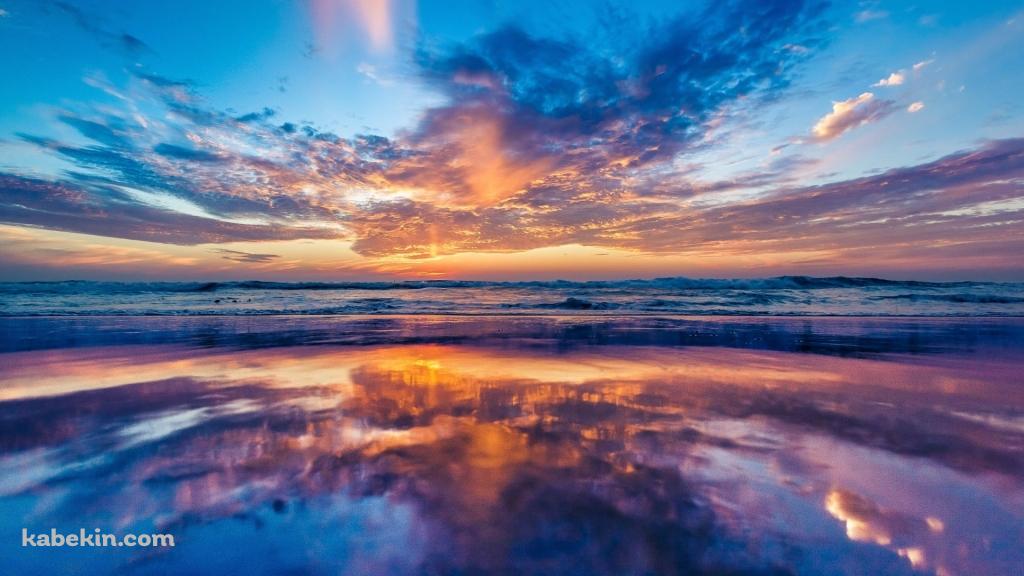 日没の綺麗な海の壁紙(1024px x 576px) 高画質 PC・デスクトップ用